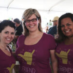 A photo of three girls smiling